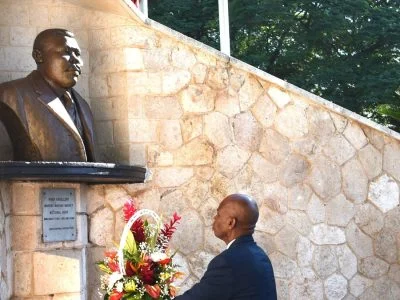 Flowers laid at the Marcus Garvey shrine at National Heroes Park in Kingston during Jamaica's Salute to the Heroes ceremony